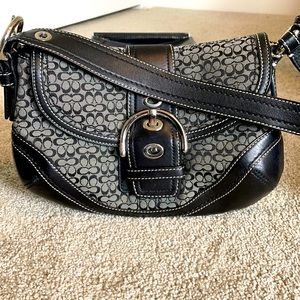 Women’s black coach leather handbag